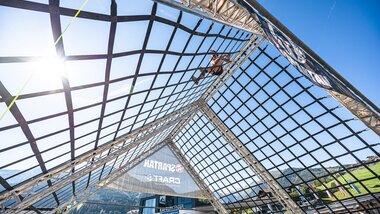 A climbing obstacle at the Spartan Race in Austria | © Zell am See-Kaprun Tourismus