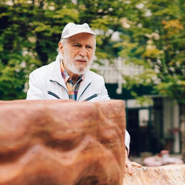 Hans Muhr beim Österreich Brunnen | © Zell am See-Kaprun Tourismus